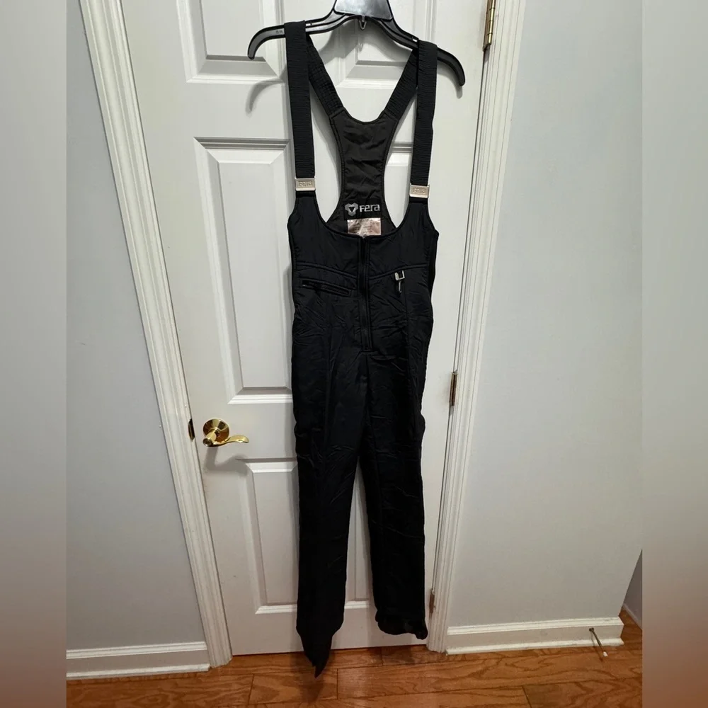 FERA size 10 black ski overalls made in Hong Kong